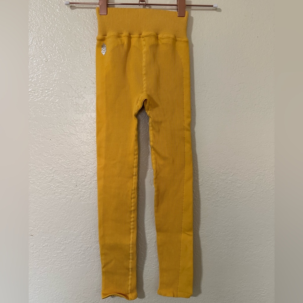 Free people free throw leggings in a golden yellow. Like new